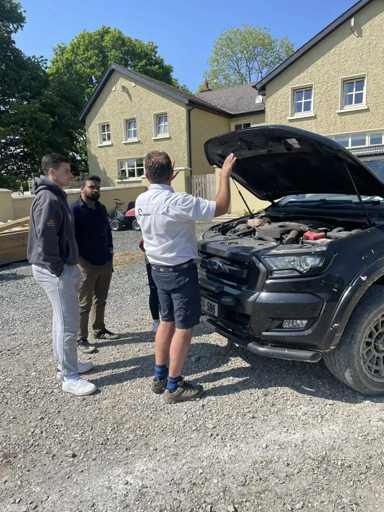 Instructor demonstrating 4x4 engine checks during LANTRA operator training in County Wexford, Ireland