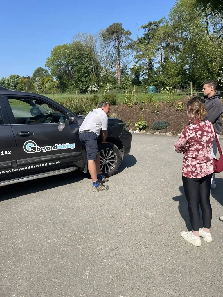 Instructor showing tyre inspection techniques during LANTRA 4x4 operator course near Enniscorthy, Wexford