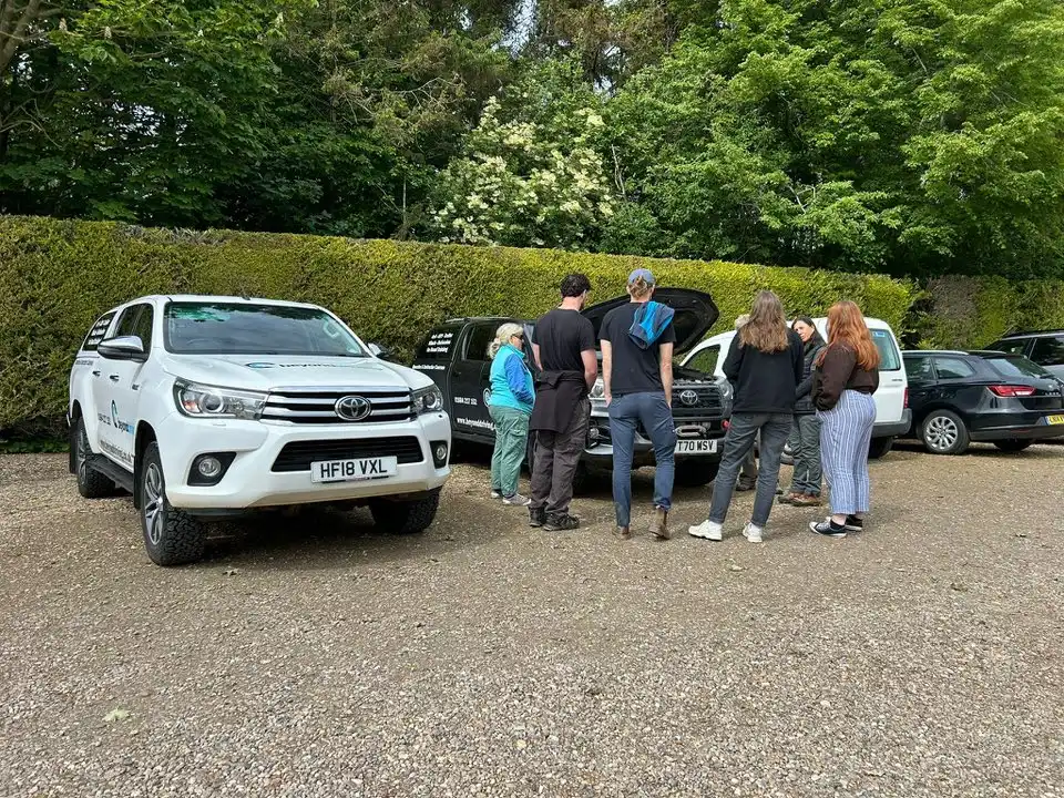 Trainees gathered around 4x4 with bonnet up during mechanical checks as part of LANTRA training in Lincolnshire