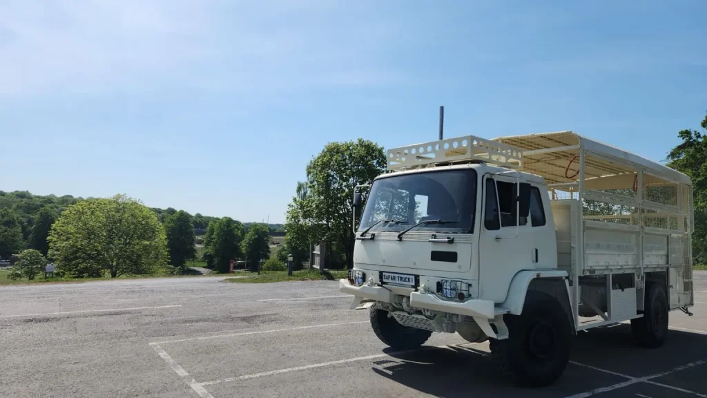 White safari truck parked in an empty lot at West Midlands Safari Park