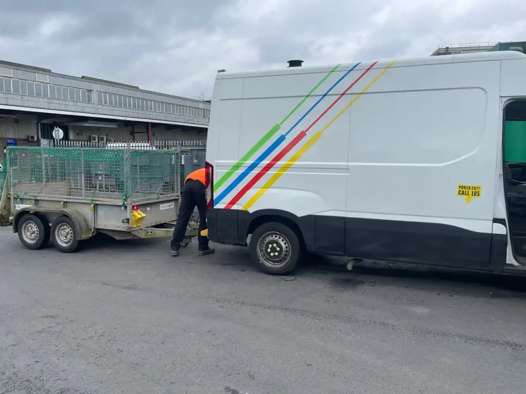 National Grid engineer securing trailer to van during Lantra training session