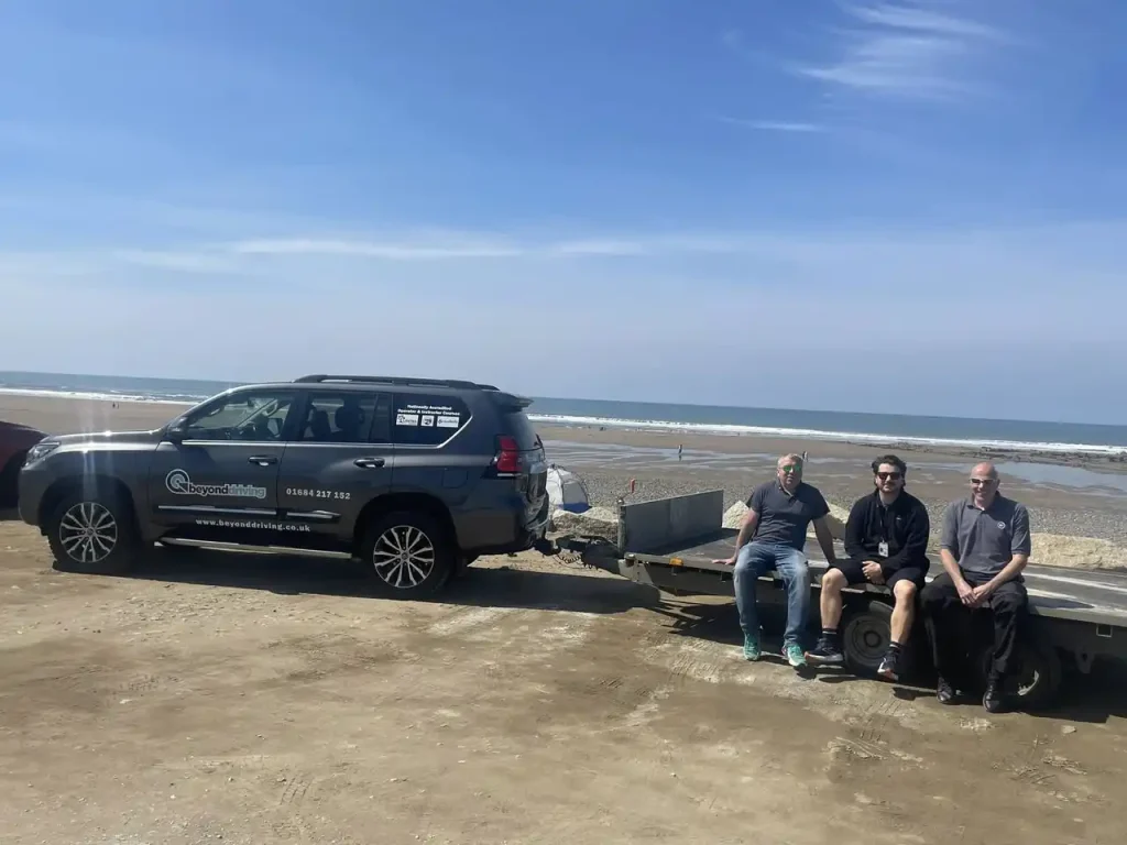 Beyond Driving instructors delivering trailer handling training on the beach in Bude for BT