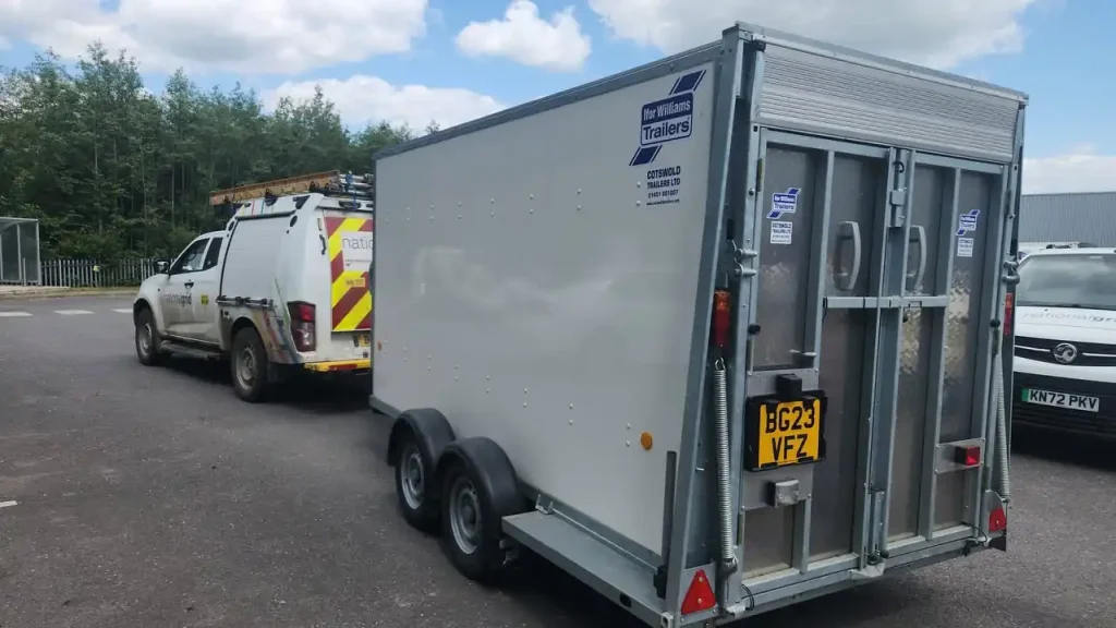 National Grid pickup towing an enclosed Ifor Williams trailer used in accredited trailer training