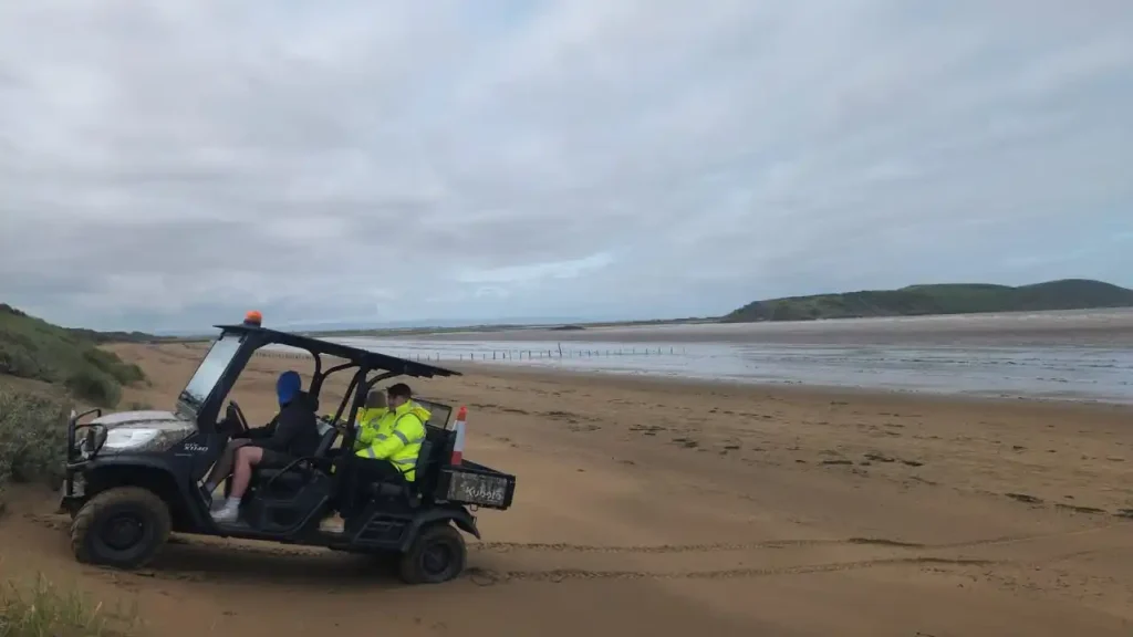 rainees navigating sand dunes in a Kubota RTV during BORDA UTV training.