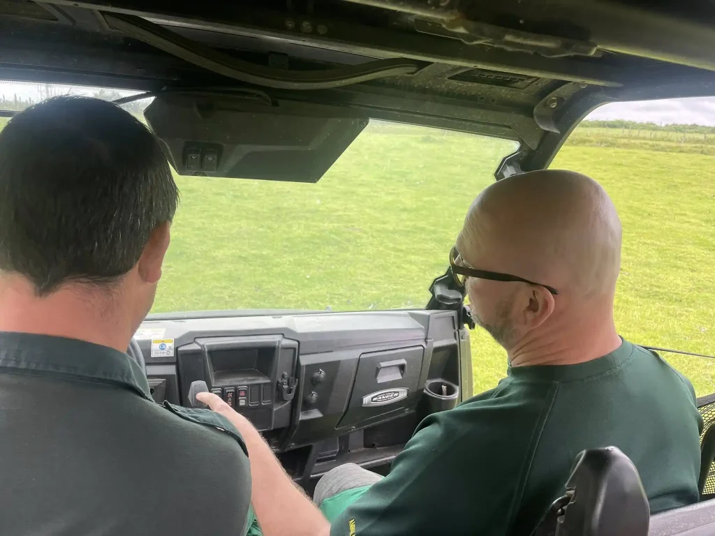 nstructor coaching HART trainee inside Polaris UTV during Beyond Driving winch training session