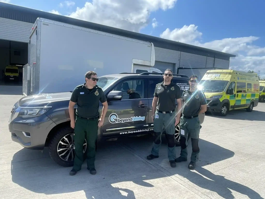 South Western Ambulance Service HART team with Beyond Driving vehicle and Land Rover ambulance during 4x4 instructor training