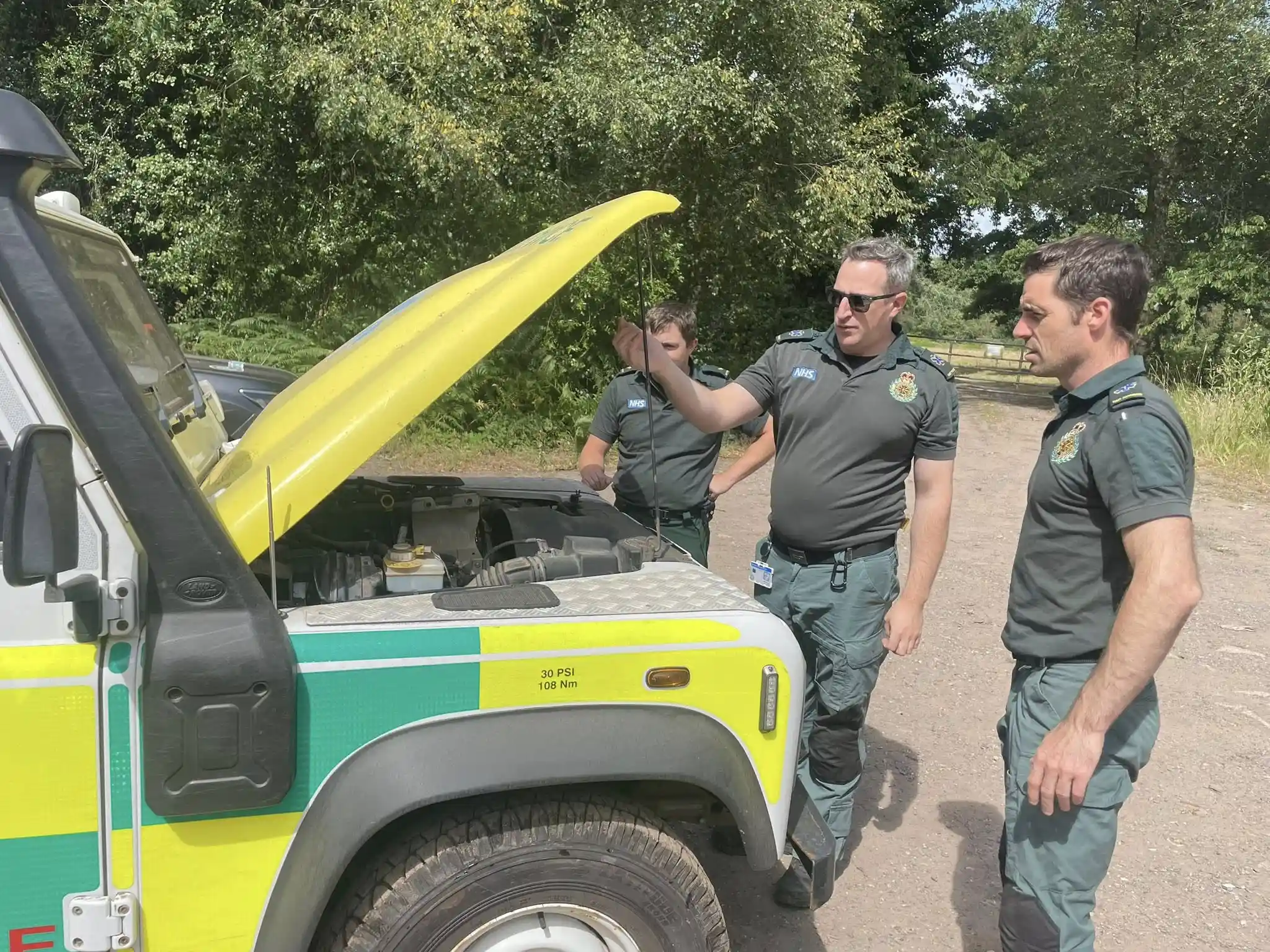 NHS HART team learning under-bonnet checks during Beyond Driving off-road instructor training session