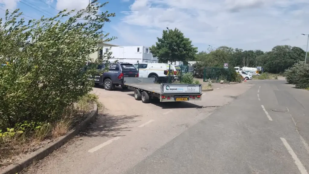 Beyond Driving 4x4 towing flatbed trailer during trailer training at Tewkesbury site