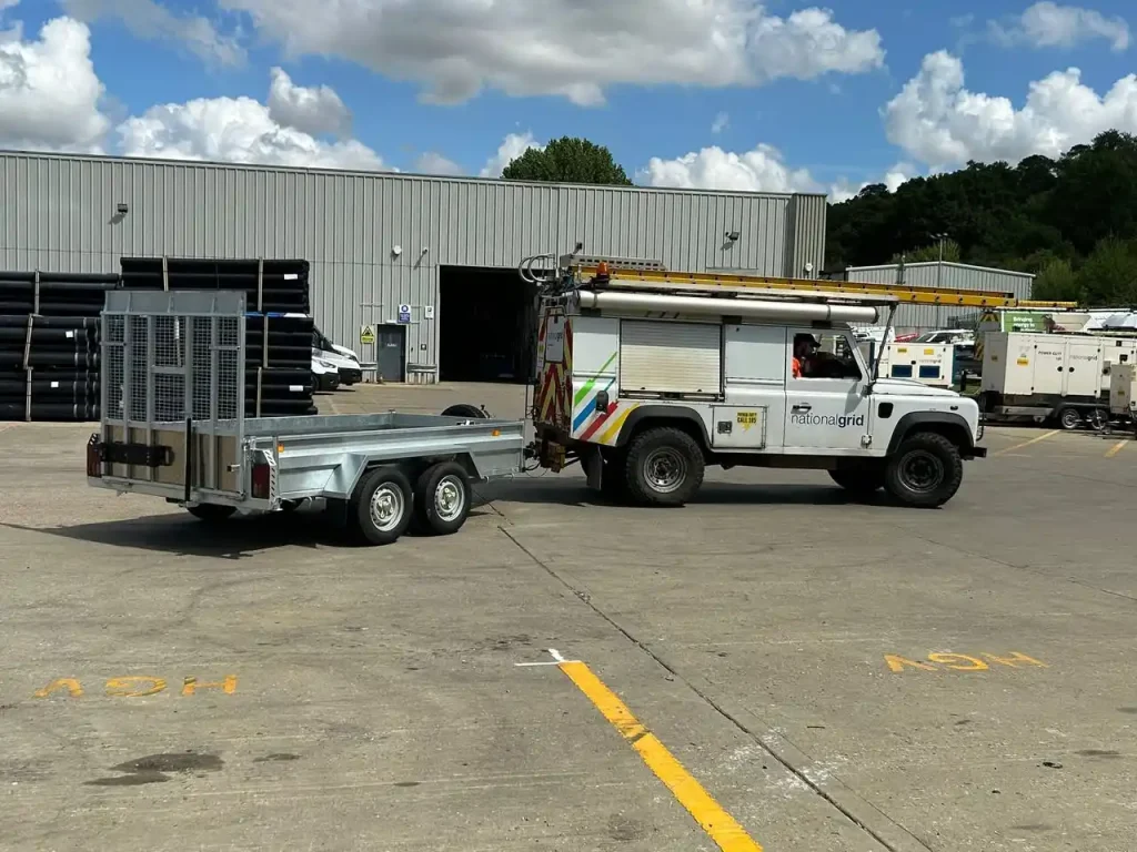 National Grid Land Rover towing twin axle trailer during professional trailer training session