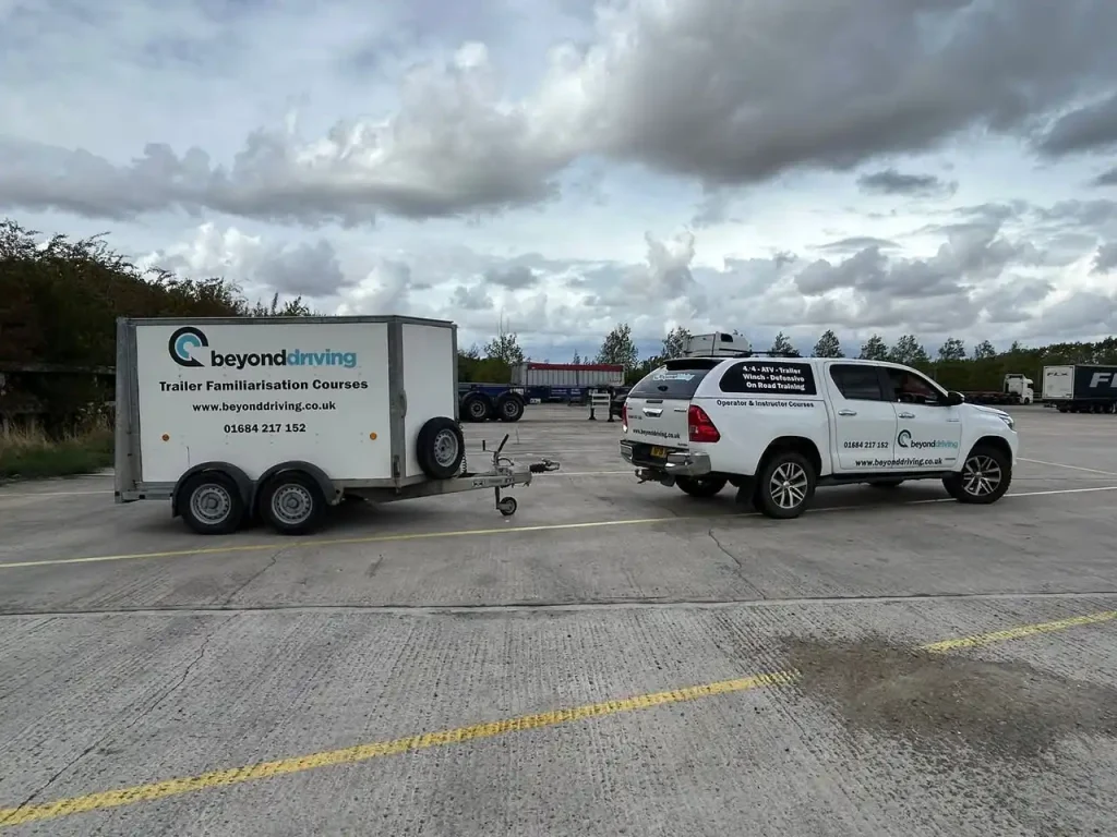Trainee connecting Beyond Driving training trailer to 4x4 vehicle in Lincoln