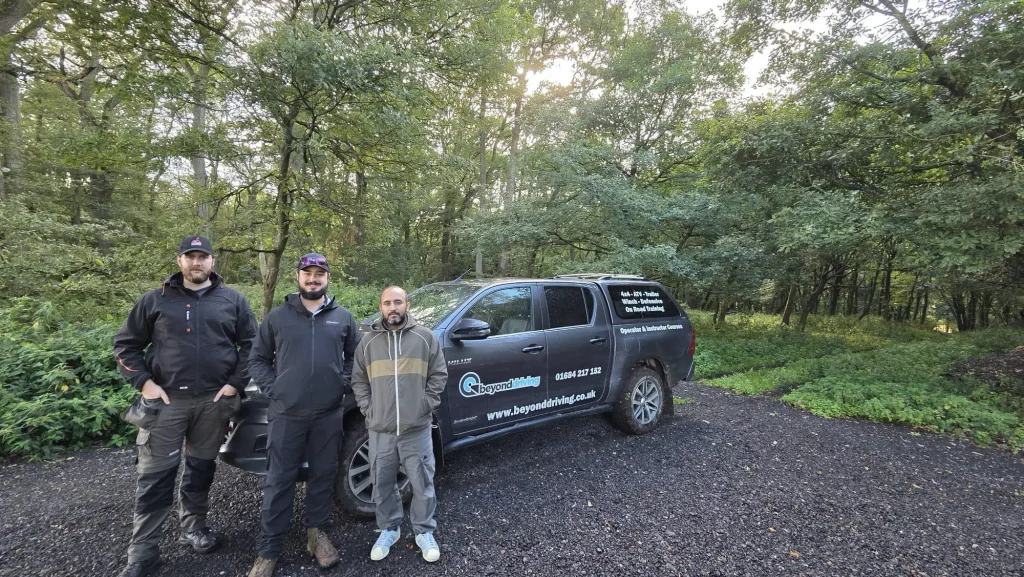 Beyond Driving trainees at forest training site with 4x4 vehicle
