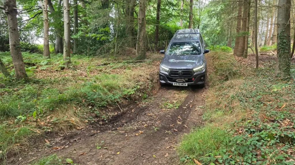 Beyond Driving 4x4 instructor with trainees and Toyota Hilux near Exeter