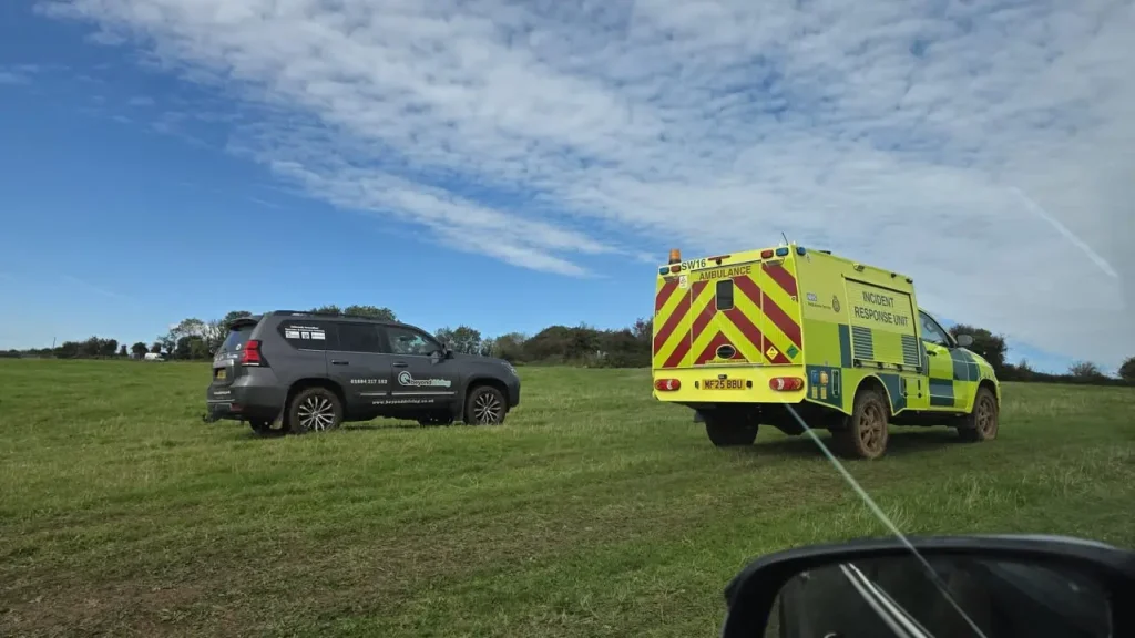 Beyond Driving and South Western Ambulance training side by side on grassy terrain
