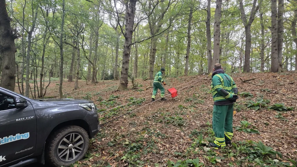 HART team members rigging winch lines and assessing anchor points during Beyond Driving’s refresher training session.