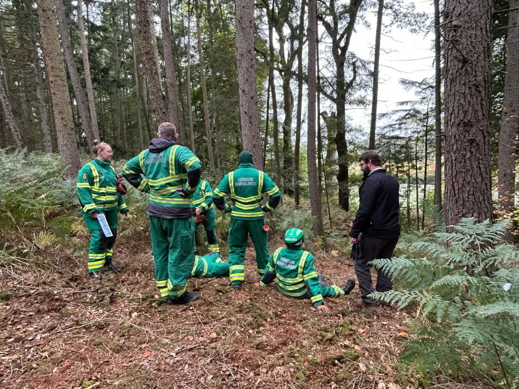 London Ambulance Service HART team gathered for a field briefing with Beyond Driving instructor during winch and Polaris refresher training.