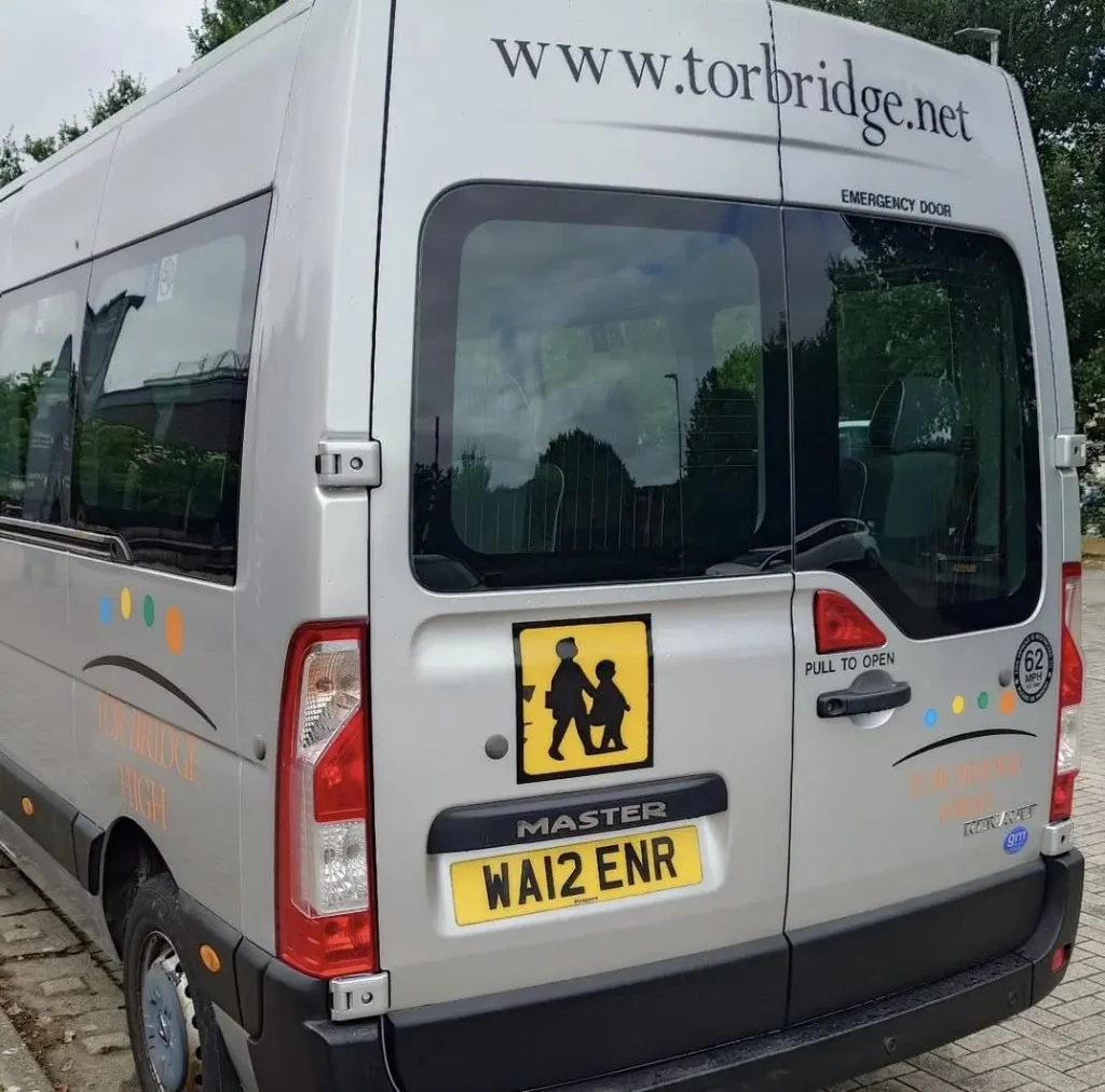School minibus at Tor Bridge High School undergoing D1 driver risk assessments by Beyond Driving.