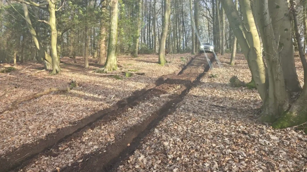 PUWER compliant 4x4 training with Beyond Driving instructors navigating woodland terrain