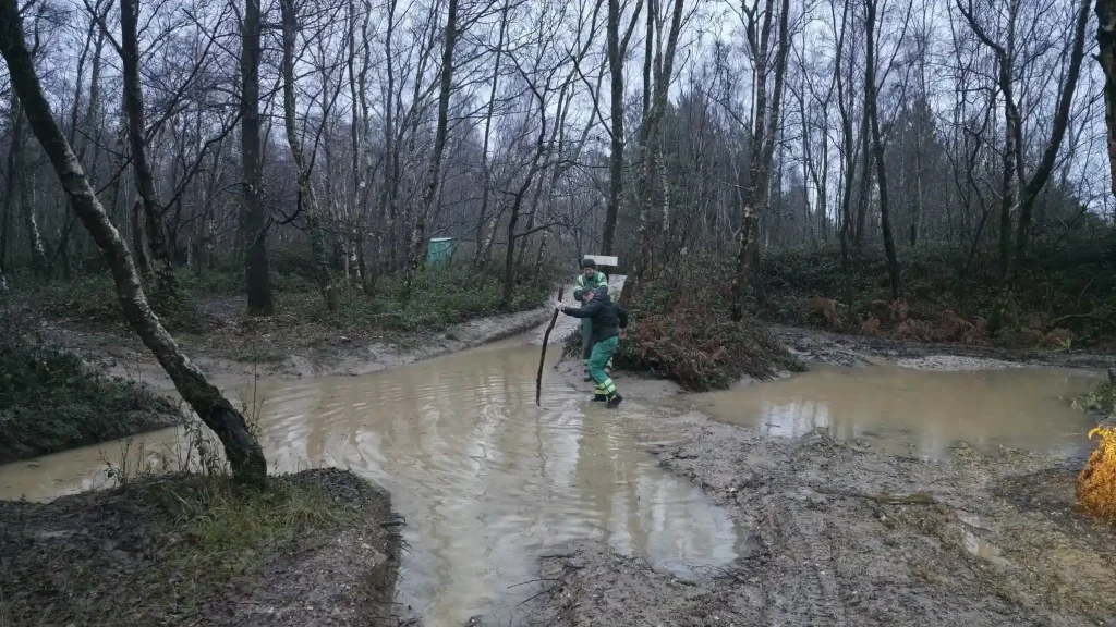Qualsafe Level 4 instructor candidates assessing water depth during off-road training for NHS HART teams