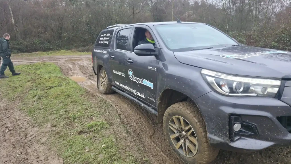 Qualsafe Level 4 instructor candidates assessing water depth during off-road training for NHS HART teams