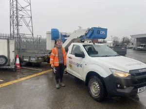 National Grid operative with Isuzu pickup and plant trailer during Lantra trailer handling training at depot site