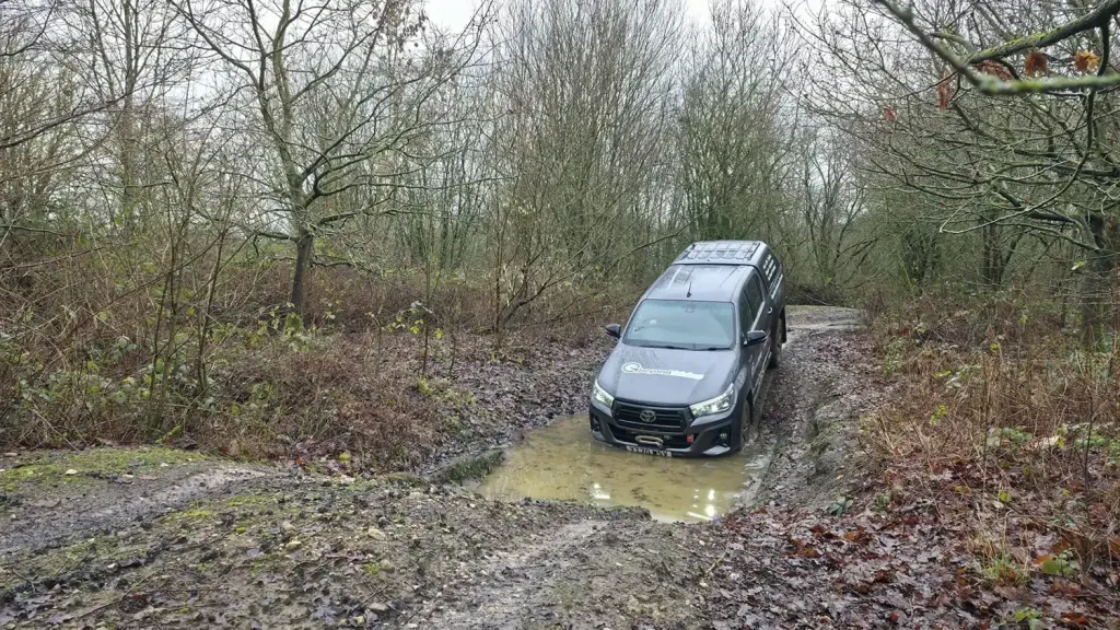 Flooded track driver training with Openreach 4x4 vehicle during Lantra-accredited off-road course in wet conditions