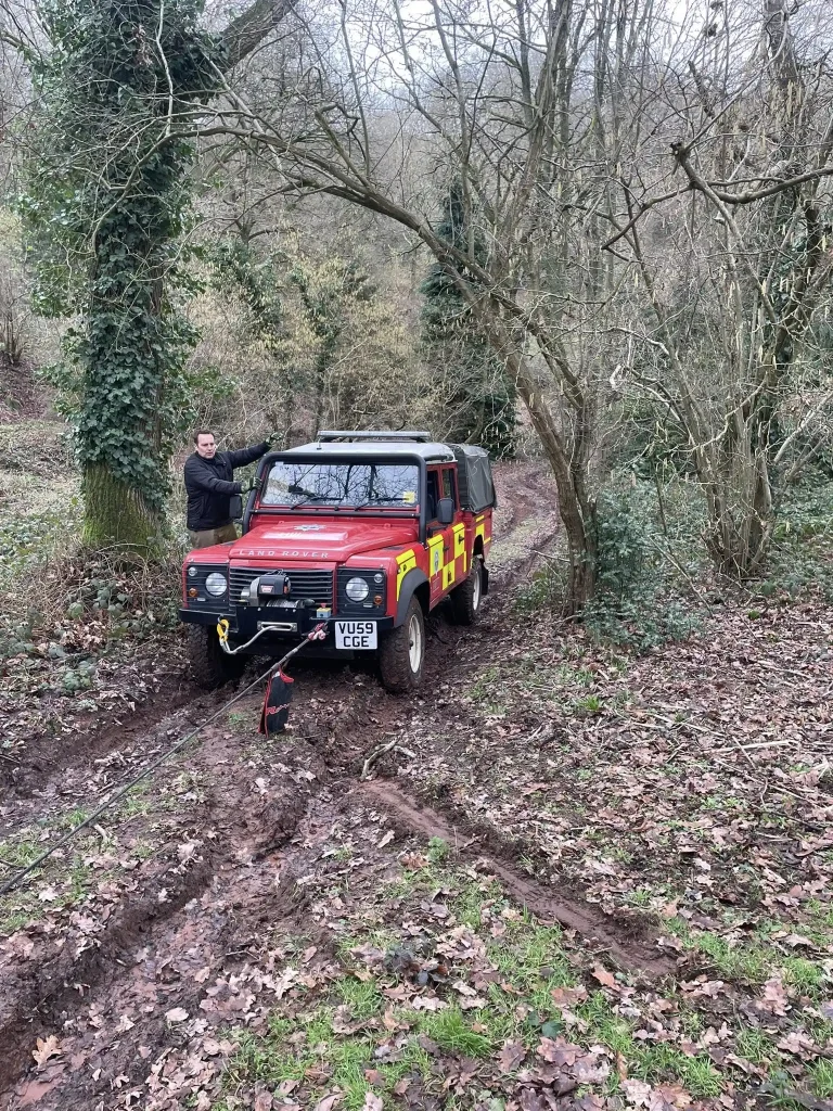 Hereford and Worcester Fire and Rescue Land Rover Defender undertaking controlled winch recovery during instructor training