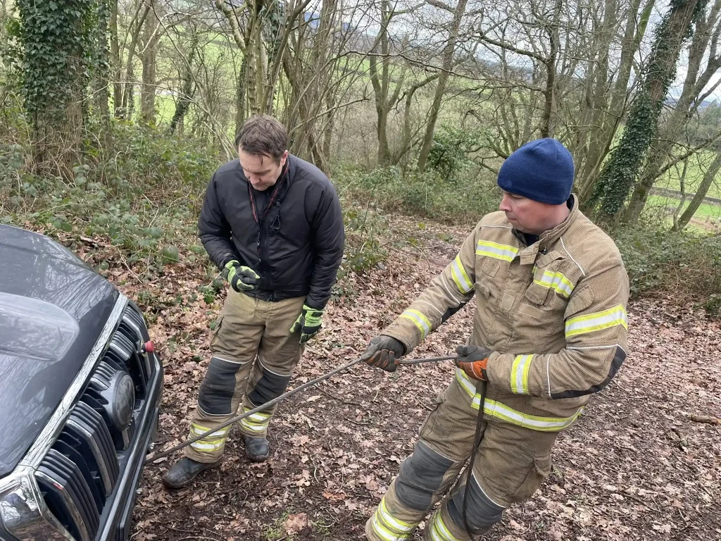 Fire and rescue personnel practising safe winch line handling during Qualsafe winch instructor training