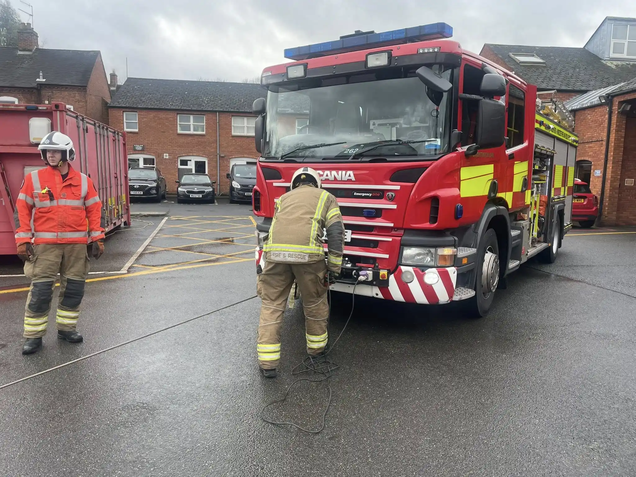 Firefighter conducting front-mounted winch setup during Qualsafe accredited winch instructor training with Beyond Driving