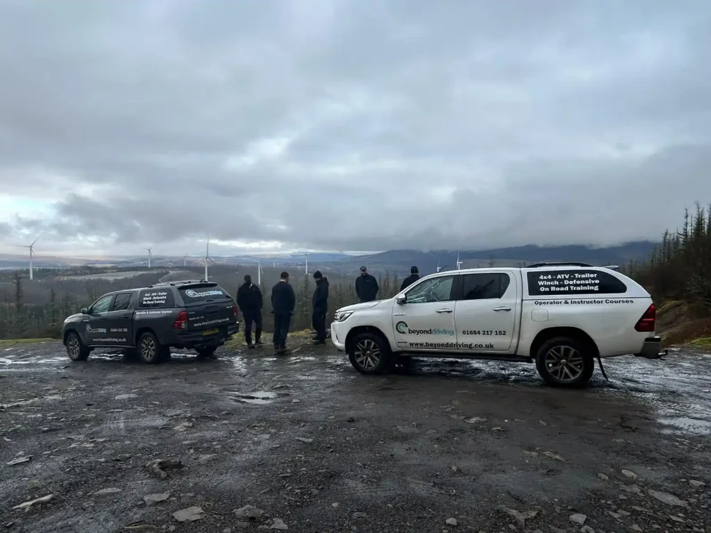Lantra 4x4 training in North Wales – Beyond Driving vehicles overlooking valley wind farm access tracks