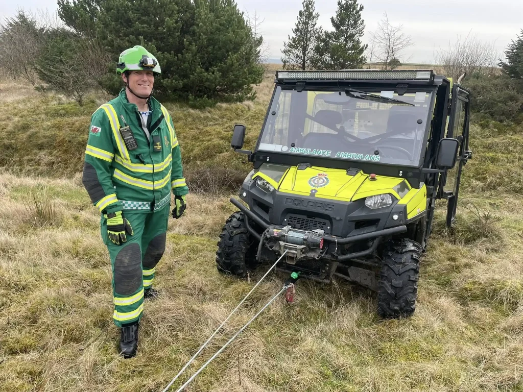 Welsh Ambulance Service HART paramedic beside Polaris off-road response vehicle during specialist winch and recovery training delivered by Beyond Driving