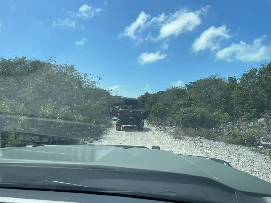 4x4 convoy driving during off-road driver training on rugged terrain in the Turks and Caicos Islands.