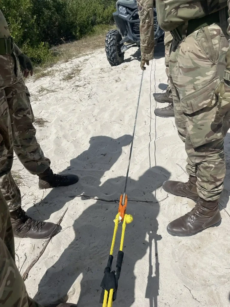 Vehicle recovery demonstration using winch equipment during military training