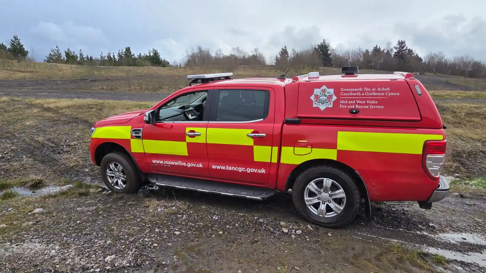 Fire service response vehicle driving off-road during instructor training