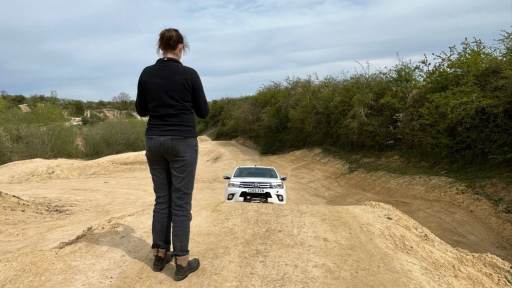 4x4 vehicle approaching steep off-road incline during Lantra training near Peterborough
