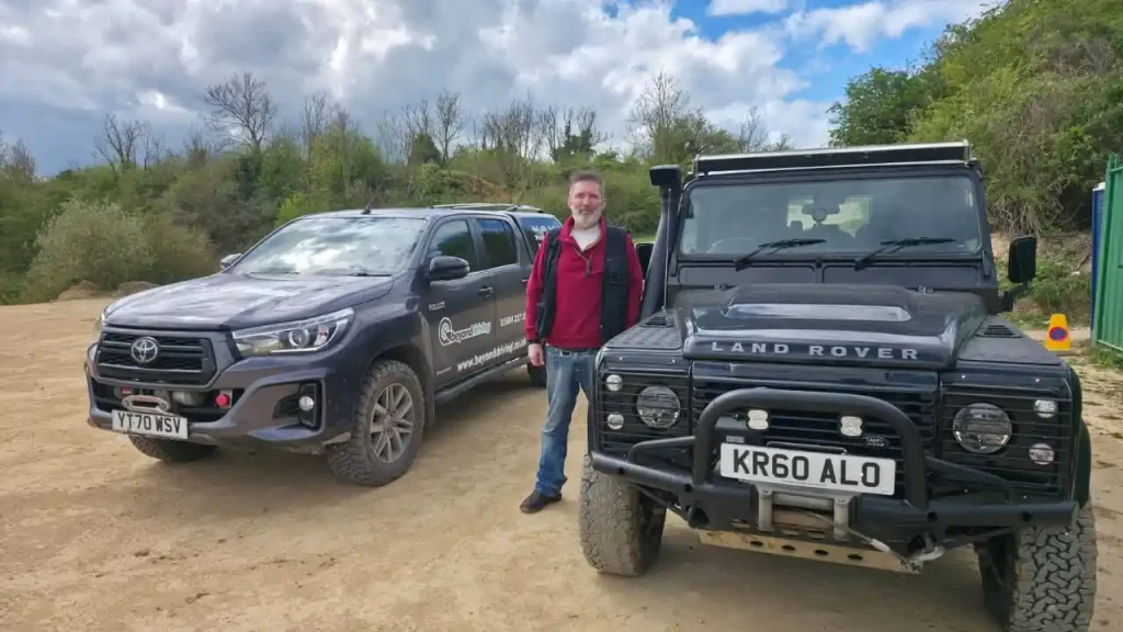Beyond Driving client with Land Rover Defender and Toyota Hilux at Peterborough off-road site