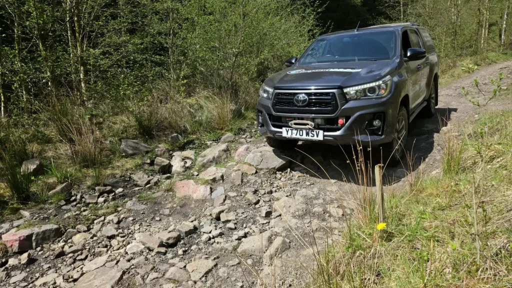 Beyond Driving 4x4 vehicle on rough rocky off road track during driver training near Neath