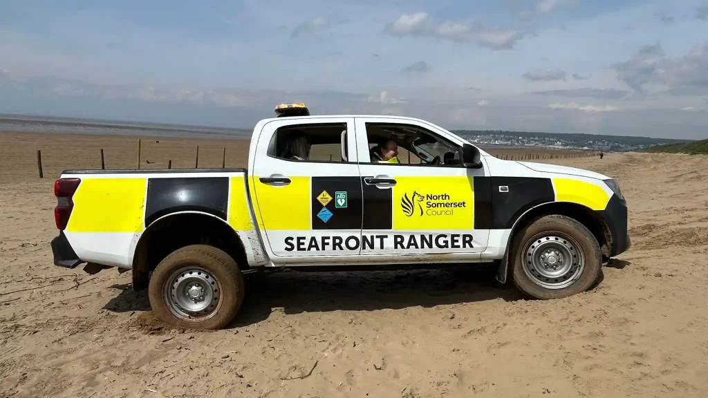 North Somerset Council Seafront Ranger vehicle practising beach driving on sand at Weston-super-Mare