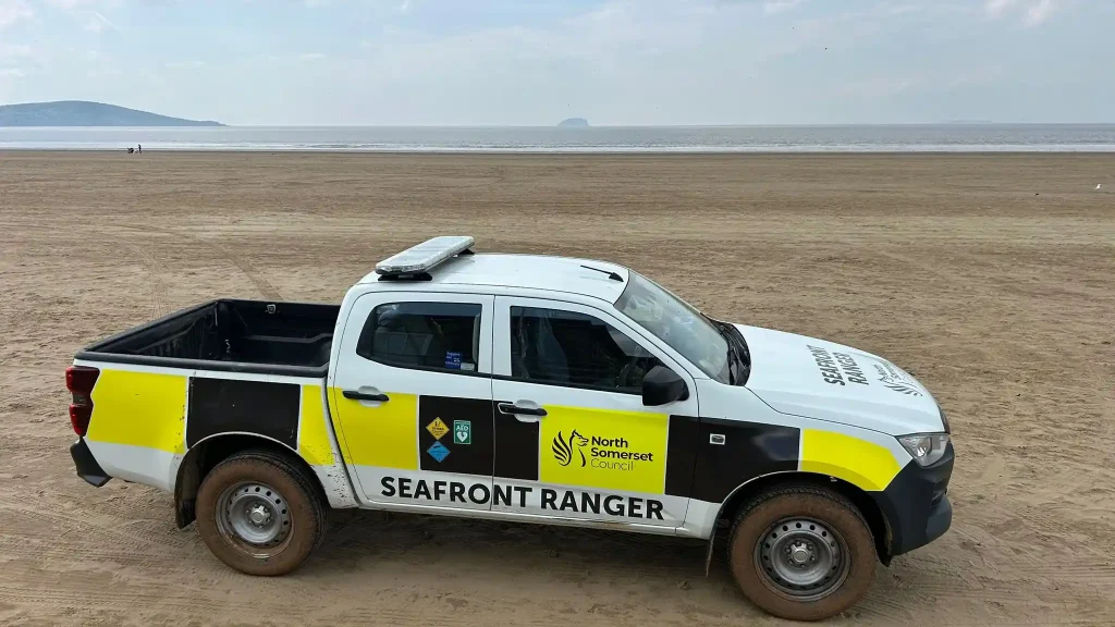 North Somerset Council Seafront Ranger vehicle practising beach driving on sand at Weston-super-Mare