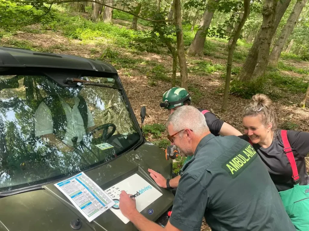London Ambulance HART recruits reviewing safe route planning during UTV operator training