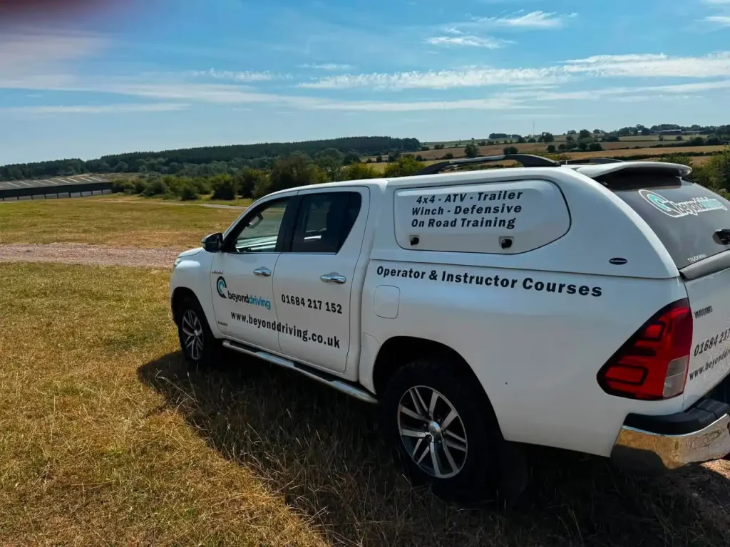     Beyond Driving training vehicle overlooking the off-road training area used for Lantra 4x4 operator courses