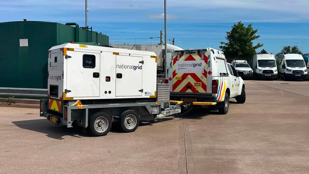 National Grid utility vehicle towing a heavy generator trailer during Lantra trailer handling course