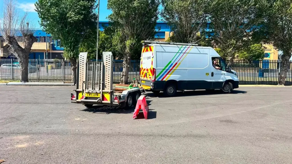 National Grid van coupled to twin-axle plant trailer during trailer handling training